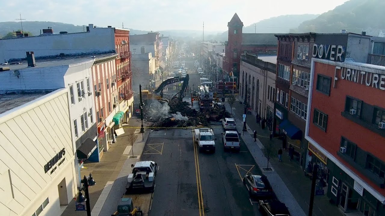 Drone captures destroyed buildings from massive fire in Dover